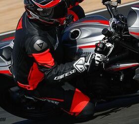 A photograph showing a female rider on a Kawasaki Ninja sportbike wearing  one of the best leather motorcycle pants for women with CE armor featured  in this review guide  Motorcycle Gear