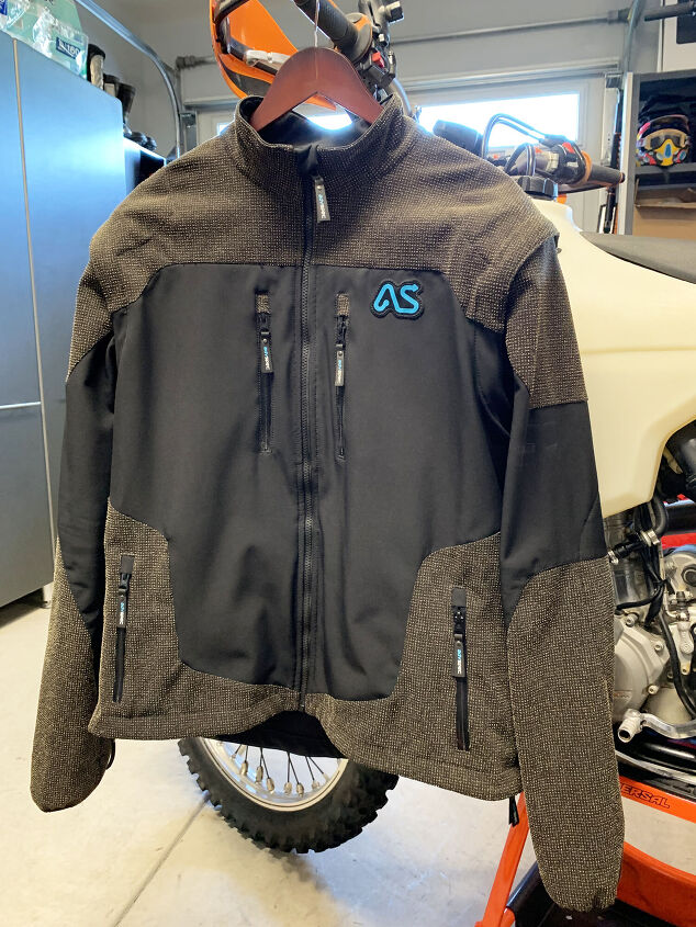Adventure Spec’s Linesman jacket is a windproof, breathable Kevlar reinforced soft-shell outer layer designed for trail and dual sport riding in mostly dry climates. Large rear vents, chest pockets with vented lining, rear zippered pockets and removable sleeves provide plenty of storage and cooling as needed. Forcefield Isolator Level 2 back, shoulder and elbow armor is included, and is easily removable; we’re certified CE EN17092 for motorcycle use. Light, comfortable, and refined, AS says the Linesman weighs just 914 grams, or 2 pounds. $389