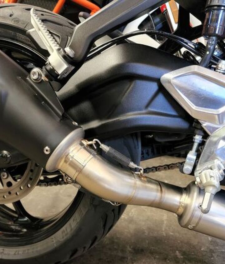 I didn’t have any clearance issues for my heels with the exhaust’s mid-pipe or silencer, but with size 10.5 boots, my heel was butted up against the passenger footpeg bracket when the front of the ball of my foot was on the peg. While the passenger footpegs are easily removable, the Akrapovič system uses the right side’s as a mounting location. Also, a heat shield is available to cover the last bend in the mid-pipe before the silencer for an additional $81.