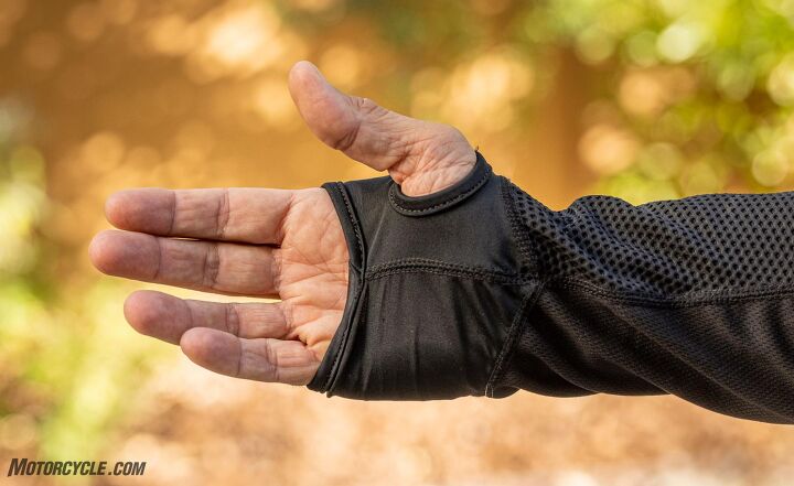 A feature I really like is the thumb loops that keep the sleeves from sliding up my arm when donning an outer layer or sliding on my side in the dirt.