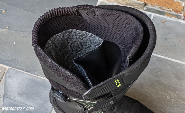 The wide opening can accommodate a variety of calf sizes. The inner flap illustrates how high the Gore-Tex liner comes up above the sole.