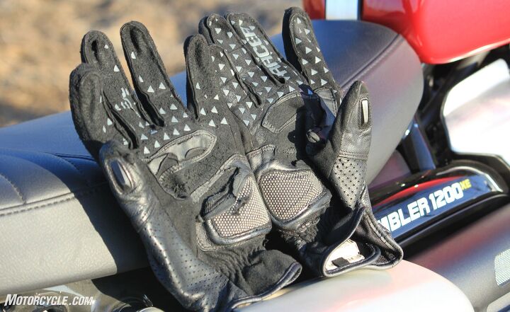 The palm slider had completely peeled back on the right glove, breaking away at the stitching (likely due to sweat drying out the leather at its most vulnerable areas), while the left palm slider wore through at the leading edge from contacting the handlebar.