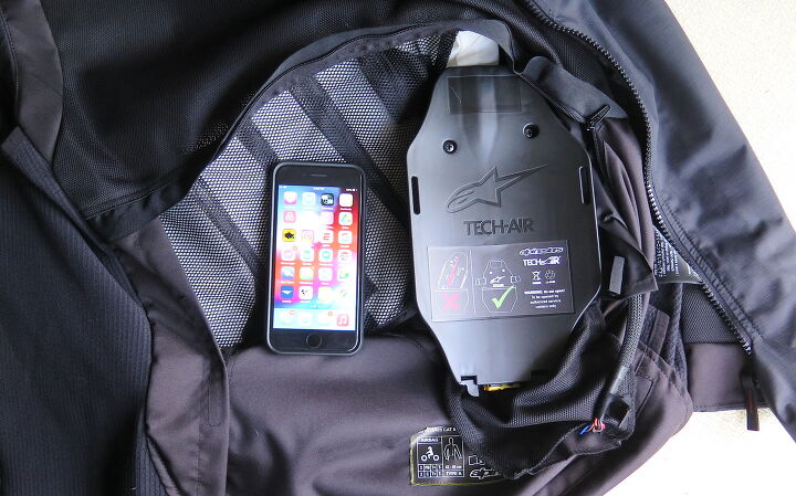 In the earlier Tech Air 5, the canister housing is contained in the built-in back protector. Since the Tech Air 3 doesn’t come with a hard back protector (only a pocket for one), the housing had to find a new home. I’m not certain it’s a good one.