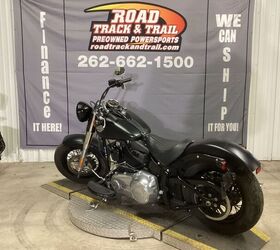 only 7726 miles 103 motor 6 speed trans stock and clean blacked out softail