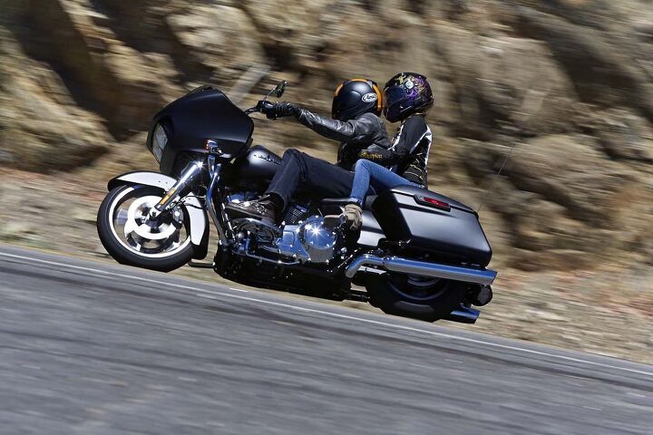 2015 harley davidson road glide first ride review video, The Road Glide is comfortable two up for short periods As is the passenger seat which while well padded is narrow and has downward slope My co tester by marriage Maria kept having to riggle forward lest she be sliding down the rear fender