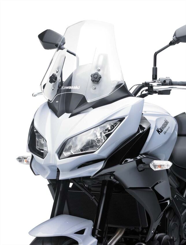 2015 kawasaki versys 650 abs 650 lt preview video, The Versys finally gets more contemporary styling with side by side headlights and a more angular nose Also note the height adjustable windscreen