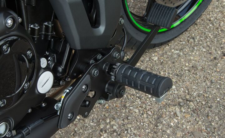 2015 kawasaki vulcan s abs first ride review video, If you look closely where the peg mounting bracket attaches to the frame you can see the hole for moving the assembly rearward