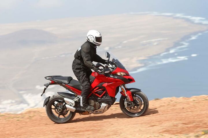 2015 ducati multistrada 1200 and 1200s first ride review video, Steps to make the Multi more off roady included raising the engine 20mm making it slimmer of waist etc but the handlebar s too low for standing up Does this look dangerous to anybody but me