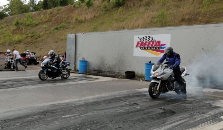 motorcycle drag racing at king of the north dragway video, Racers prepare to get their adrenaline fix at King of the North Dragway