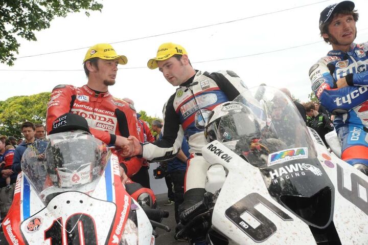 top 5 storylines for the 2015 isle of man tt, Conor Cummins and Michael Dunlop congratulate each other after the 2014 TT