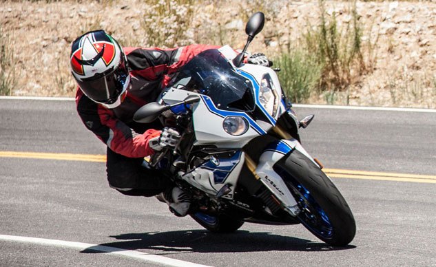 2013 exotic superbike shootout street video, In its blue and white race livery the HP4 is as attractive as it is fast The adaptive nature of its Sachs semi active suspension will change the paradigm of sportbike damping control