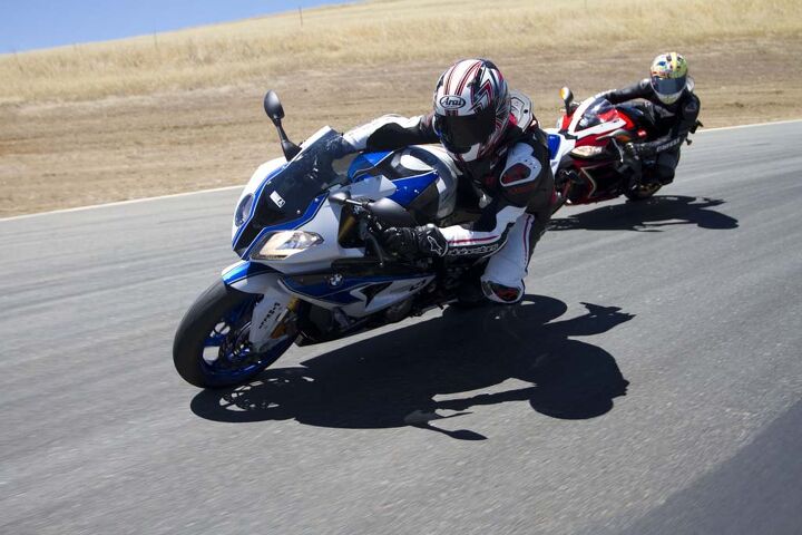 2013 exotic superbike shootout track video, Both the BMW and Aprilia can carve a tight line through any apex We were pleasantly surprised to experience a dramatic difference in turn in from the HP4 compared to the S1000RR thanks to its lightweight forged wheels