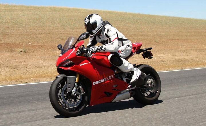2013 exotic superbike shootout track video, Ducati s 1199 Panigale R defies V Twin convention Titanium connecting rods allow the Superquadro engine to spin faster while rewarding the rider who dares rev it to the moon