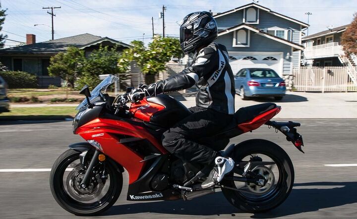 middleweight intermediate sportbike shootout video, The Ninja is a very favorable motorcycle from the waist up The bars place you virtually upright and decent wind deflection is given from the screen However the high pegs present a tight squeeze for those with long legs