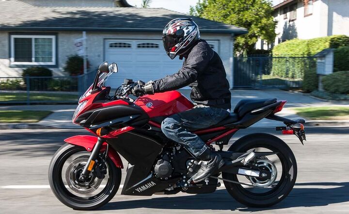 middleweight intermediate sportbike shootout video, Meanwhile the FZ6R strikes a nice balance between the Kawasaki and the Honda its rider only leaning slightly forward knees not quite as bent as on the Ninja