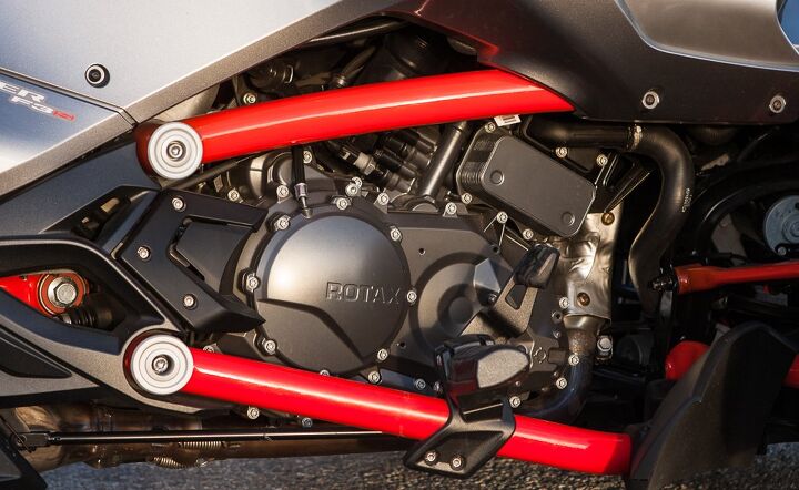 polaris slingshot vs can am spyder f3 s vs morgan 3 wheeler, The 1330cc Rotax Triple powering the F3 is a massive performance upgrade over the 998cc Rotax Twin in other models It s slow to spin but produces gobs of midrange grunt Note the adjustable footpeg part of the F3 s UFit system I loved the silver gray black colors of our tester accented by the glow of lava colored frame rails says Duke