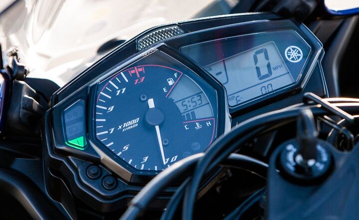 beginner ish sportbike shootout video, An analog tachometer dominates the view from the R3 s gauge cluster its needle easy to read even in glaring sunlight We liked that Yamaha also included a gear position indicator on its entry level sportbike the costlier KTM was the only bike also equipped