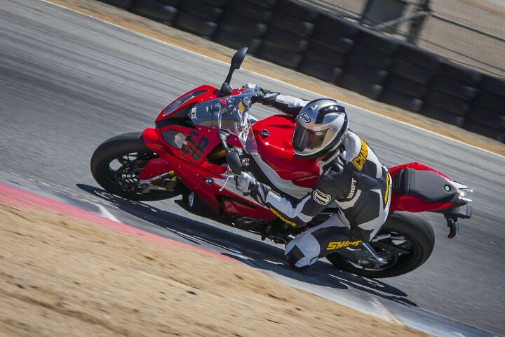 2015 six way superbike track shootout video, We were surprised to hear Chandler didn t mind the ride by wire throttle of the BMW For as stoic as he is that s about the highest praise BMW will get about its electronic throttle calibration