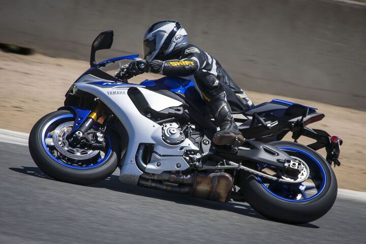2015 six way superbike track shootout video, Yamaha s tagline for the new R1 is MotoGP for the street It would appear Doug Chandler agrees noting The new R1 felt the closest as far as a real race bike out of the box its seat height and how it would want to turn into the corner for you just reminds me of a race bike