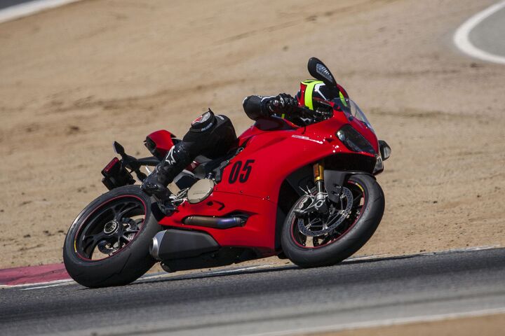 2015 six way superbike track shootout video, Wide bars give the Ducati rider lots of leverage to turn the bike to and fro The lightest wet weight here also makes that task easier