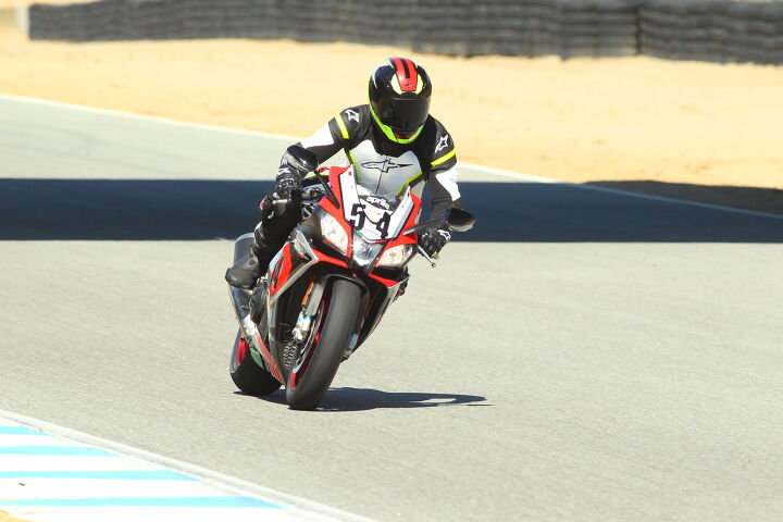 2015 six way superbike track shootout video, Siahaan seen here is 5 foot 8 inches 153 lbs and even he makes the Aprilia look tiny Apparently only small Italians named Max Biaggi look proper aboard the RSV4