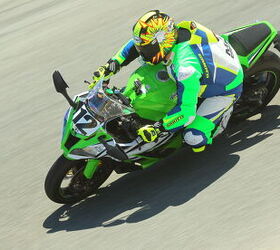 2015 six way superbike track shootout video, Because the ZX 10R isn t bright enough in its 30th anniversary color scheme Sean took it upon himself to up the brightness level with his custom Gimoto leathers