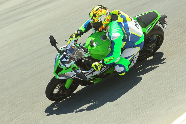 2015 six way superbike track shootout video, Because the ZX 10R isn t bright enough in its 30th anniversary color scheme Sean took it upon himself to up the brightness level with his custom Gimoto leathers