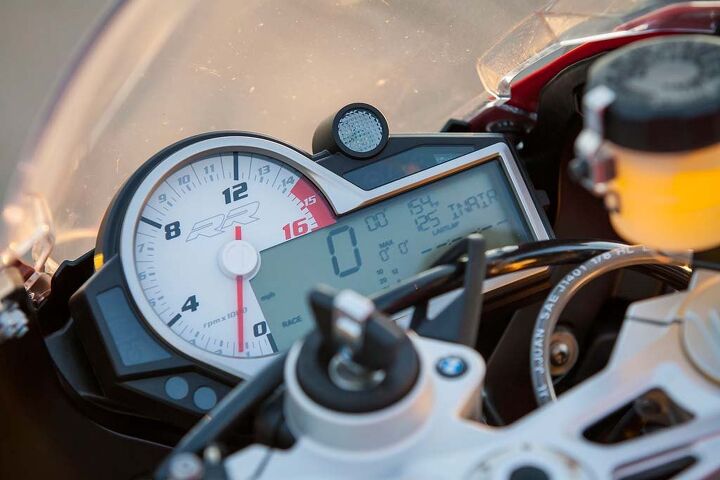 2015 six way superbike street shootout video, The BMW s gauge cluster has a lot of info wrapped up in a small LCD screen that Siahaan says is the most intimidating I m sure if this were my only bike and I had a chance to thoroughly read the owner s manual I d learn it all but to simply hop on and ride it s confusing