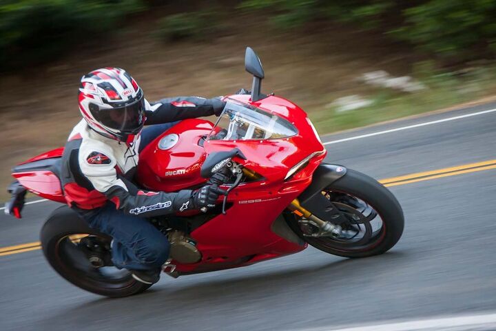 2015 six way superbike street shootout video, You can feel the electronic suspension firm up in the fork to control dive says Duke of the semi active hlins NIX30 fork The Brembo M50s easily won the Braking category of the ScoreCard