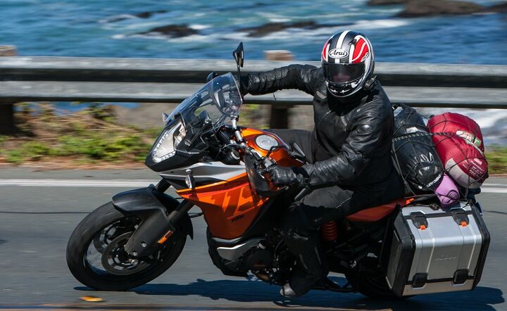2015 ultimate sports adventure touring shootout, KTM s 1190 Adventure strikes a pleasing balance between over the road and off road adventuring It boasts more horsepower 124 hp than five bikes in this test has reasonable long haul wind protection and comfort and is impossible to beat in fast dirt sections