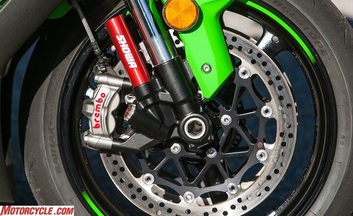 the 17 000 superbike faceoff, Showa s Balance Free Fork tech taken from the World Superbike paddock performed well in both street and track environments though the Brembo M50 calipers are the stars of this picture