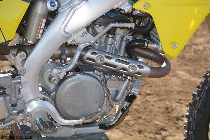 honda crf450r vs husqvarna fc450 vs kawasaki kx450f vs ktm 450 sx f vs suzuki, The Suzuki s DOHC engine may be the elder statesmen of the group but it s no slouch and it proved it by cranking out 50 7 peak horsepower at 8800 rpm