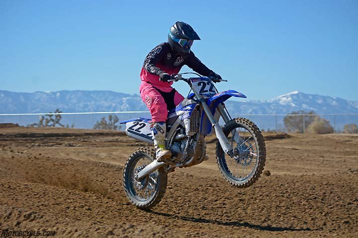 honda crf450r vs husqvarna fc450 vs kawasaki kx450f vs ktm 450 sx f vs suzuki, The YZ450F may be the most brutal machine in the class when it comes to aggressive power delivery The arm stretching blue bike is fun to ride but can be little taxing on novices and even pros during a long moto