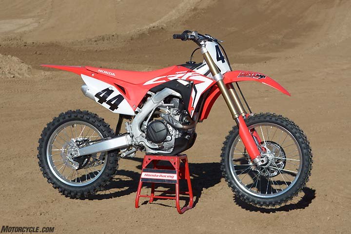 honda crf450r vs husqvarna fc450 vs kawasaki kx450f vs ktm 450 sx f vs suzuki, The Honda CRF450R is all new for 2017 Honda engineers worked on producing more power and redesigning the chassis for better flex characteristics The CRF also does away with its air fork in favor of a coil spring fork