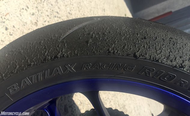 2017 superbike track shootout, All bikes in our test were outfitted with Bridgestone s sticky Battlax Racing R10 tires The DOT legal race tires coped well with triple digit horsepower and triple digit speeds even on Auto Club s several long left hand corners that gnaw into rubber Despite the challenges to the tires our testers didn t complain about grip until nearing the end of the day when the buns were spent