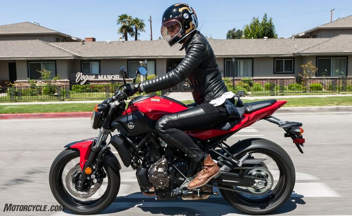 middleweight naked bikes a 2017 shootout, Vogue Manor indeed Six foot Tamara likes the FZ s ergos but isn t a big fan of the thin but wide seat Note the full size 180 55 rear tire and powerful four piston brake calipers up front The FZ is not a toy