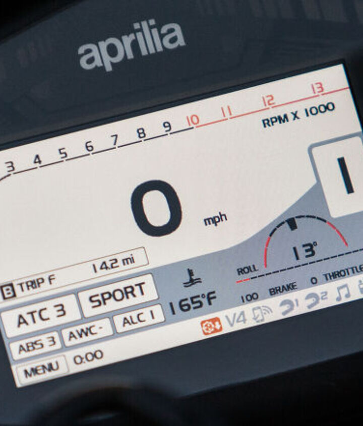 2017 supernaked streetfighter shootout, The Tuono s bright new TFT display screen remains easily readable in all lighting conditions and it s bar graph tachometer and sequential shift lights work very well together