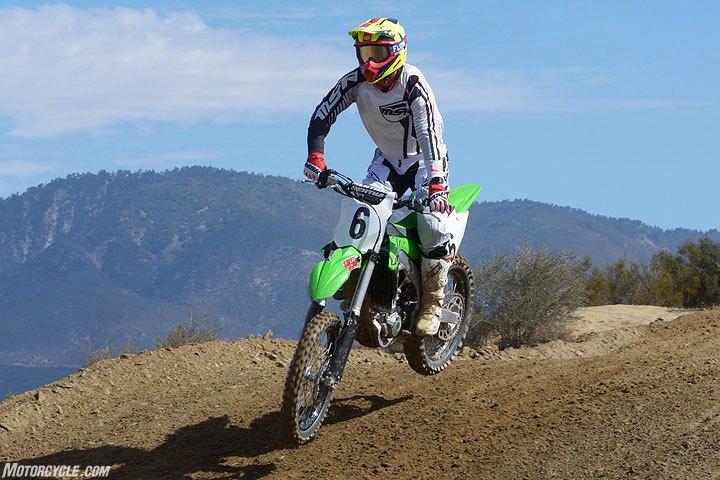 2018 450cc motocross shootout, The Kawasaki KX450F s Showa air fork and Uni Trak rear suspension are competent but lack the plush feel of other bikes in the class