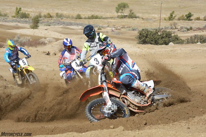 2018 450cc motocross shootout, The KTM can carve a tight line with the best of them but it likes railing outside berms where you can maintain momentum and keep the 450 SX F s engine spinnng up in the rev range