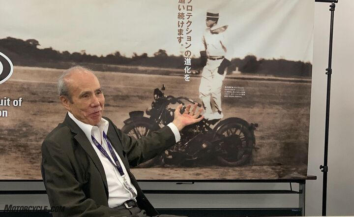 arai the philosophy behind the helmets, Michio Arai with the iconic photo of his father Hirotake Arai
