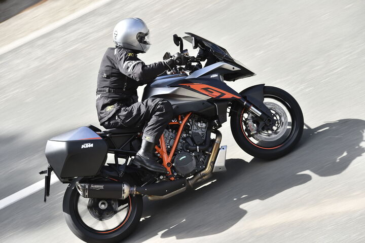 2017 ktm 1290 super duke gt first ride review, Unsurprisingly the GT proves to be easy to ride quickly with the same neutral handling enjoyed from the SDR The bike feels nicely narrow between knees despite the larger volume of the fuel tank KTM says it scales in fully fueled about 37 lbs of gas at 503 lbs