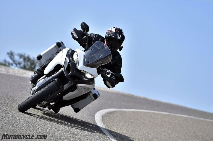 2016 ducati multistrada 1200 enduro first ride review, When set to Sport mode the Enduro s electronics allow it to make quick work of the twisty bits It s not a World Superbike spec Panigale but the stock Enduro is still plenty capable of emulating a sportbike if the rider is so inclined