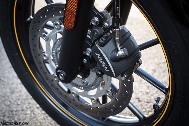 2017 triumph street cup review, An upgraded caliper replaces the Street Twin s unit and squeezes a floating 310mm disc but it s still a two piston slider It gets the job done on the road