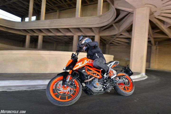 2017 ktm 390 duke review, A radially mounted four piston caliper on a 300mm rotor on the original 390 appeared to be class leading but in actual testing wasn t so the Brembo designed ByBre caliper now bites on a 320mm disc and addresses a weakness in the previous edition by providing excellent stopping power The ABS can be switched to a Supermoto setting that disables rear antilocking for hooligan skidding activity which by the way is frowned on when painting black lines on the rooftop of a century old building