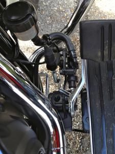 manufacturer 2012 yamaha v star 950 review 91278, Rear brake apparatus on the V Star 950 is seemingly put together with Erector Set quality The poorly devised system pushes the floorboard outward severely reducing cornering clearance