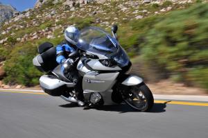 2012 bmw k1600gtl review motorcycle com, The chrome pieces above the BMW roundel can be flipped outward to direct cooking air to the rider