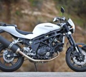 2011 hyosung gt650 vs suzuki gladius shootout motorcycle com, The Hyosung GT650 is a fairing less version of the sportier GT650R The 647cc 90 degree V Twin motivating the GT has similar architecture as the 650 in the Gladius SV650 However the Hyosung motor isn t as strong or refined as the Suzukis engine