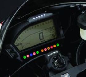 2012 honda cbr1000rr review video motorcycle com, An all new LCD gauge cluster replaces the analog digital display on the old model Note the five way adjustable shift lights and gear indicator