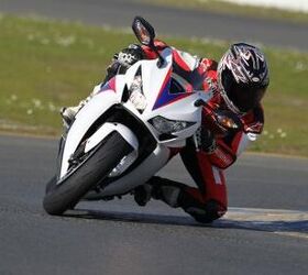 2012 honda cbr1000rr review video motorcycle com, Front end composure from the 43mm Big Piston Fork is noticeably greater compared to the traditional cartridge fork on the previous model