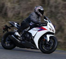 2012 honda cbr1000rr review video motorcycle com, Riders of all shapes and sizes will feel comfortable on the CBR as its riding position is relatively roomy for a supersport literbike